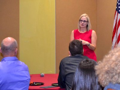 Kyrsten Sinema speaking at the Watts College of Public Service in 2019