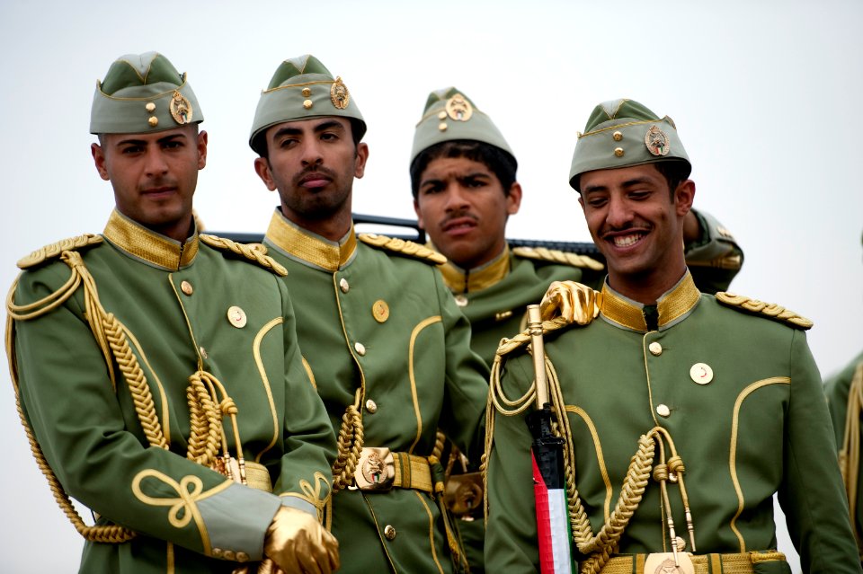 Kuwaiti soldiers wait to participate in their National Day military parade
