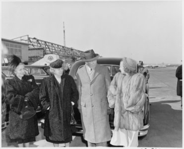 L to R, Unidentified lady, Mrs. Bess Truman, Secretary of State George Marshall, and Margaret Truman at the airport... - NARA - 199778
