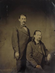 James Butler Hickok (Wild Bill) and an unidentified man by an unidentified photographer, c. 1876, tintype, from the National Portrait Gallery - NPG-NPG 85 12Hickok-000001