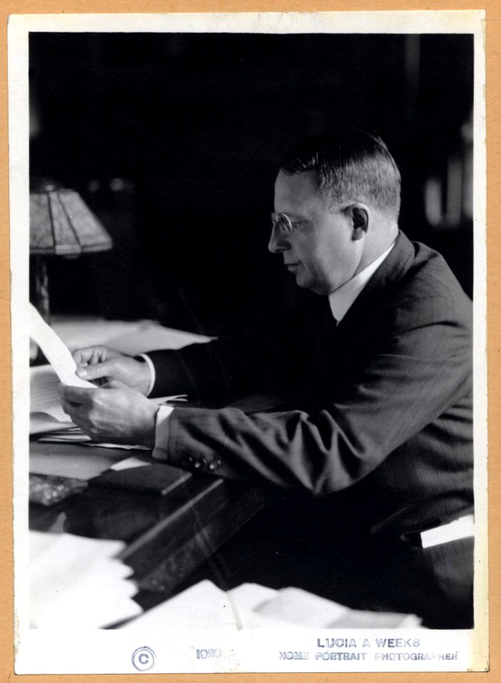 James M. Cox, Governor of Ohio, half-length portrait, facing left, seated at desk, reading) - Lucia A. Weeks, Home Portrait Photographer LCCN00652541