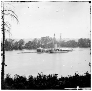 James River, Virginia. U.S. monitor CANONICUS taking on coal from a schooner LOC cwpb.01773