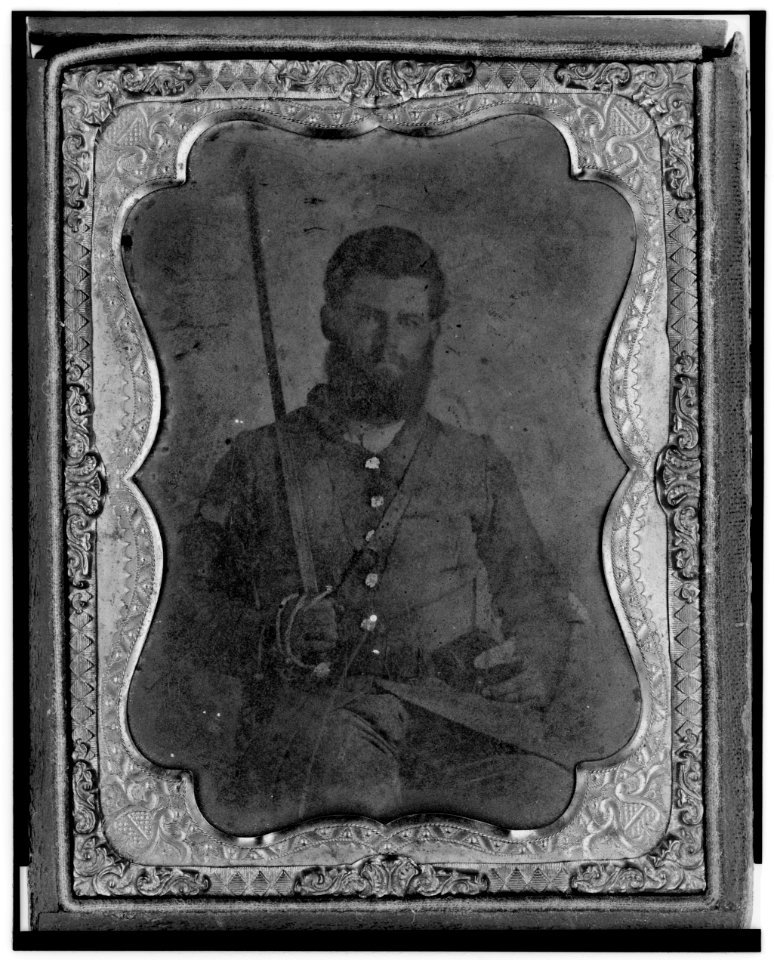 James S. Dodd, Pvt., Co. C, 4th South Carolina Cavalry, half-length portrait, seated holding saber, facing front LCCN2005695746