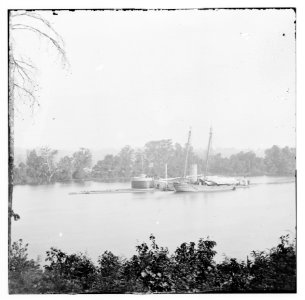 James River, Virginia. U.S.S. monitor CANONICUS taking coal from a schooner LOC cwpb.01774
