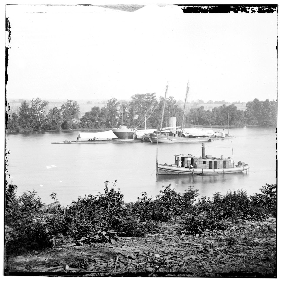 James River, Va. U.S.S. monitor Canonicus taking on coal from a schooner LOC cwpb.01770