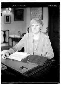 Jane D. Rippin. Seated at desk with papers before her. LCCN2014688146