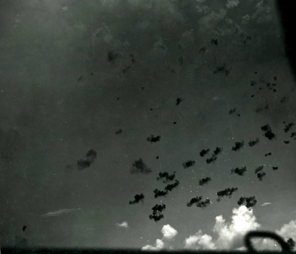 Japanese Aichi D3A under fire from USS South Dakota (BB-57) during the Battle of the Santa Cruz Islands, 26 October 1942 (80-G-33369)