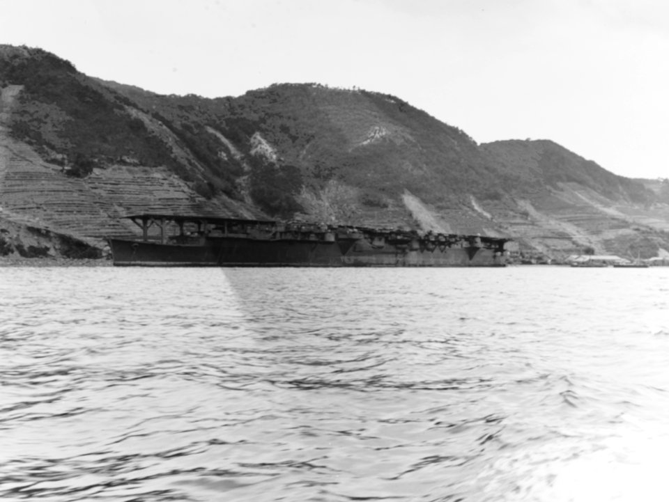 Japanese aircraft carrier Ryūhō anchored at Kure, Japan, on 9 October 1945 (80-G-351365)
