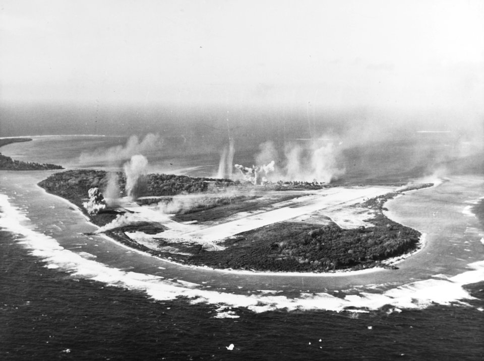 Japanese airfield on Woleai Island under attack by U.S. Navy Task Force 58 planes, on 1 April 1944 (80-G-45318)