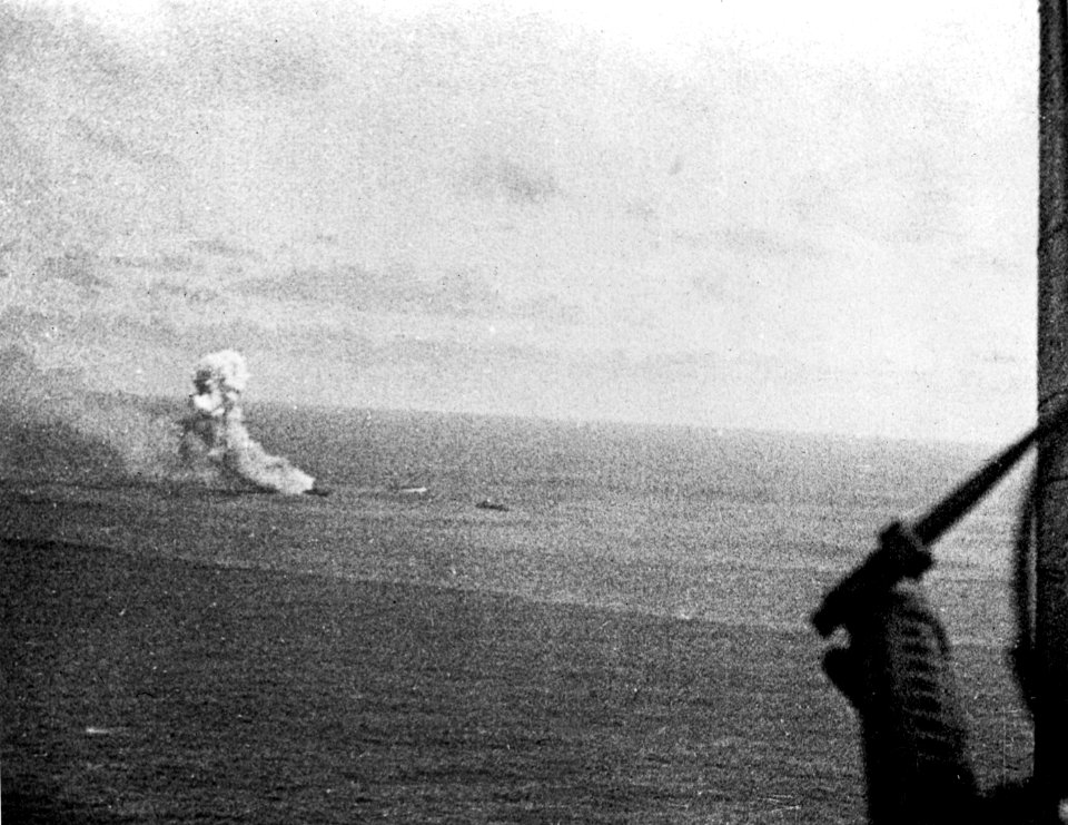 Japanese cruiser Mikuma burning with DD 1942