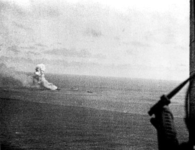 Japanese cruiser Mikuma burning with DD 1942