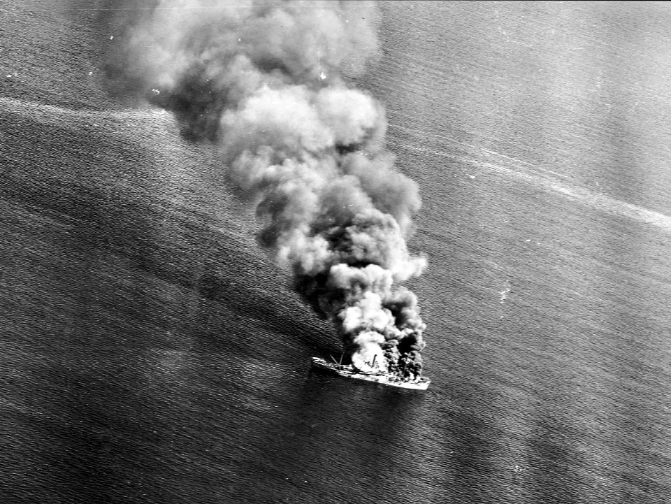 Japanese cargo ship burning off Luzon 1944