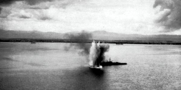 Japanese cruiser Nachi under attack by U.S. carrier aircraft off Manila, Philippines, on 29 October 1944