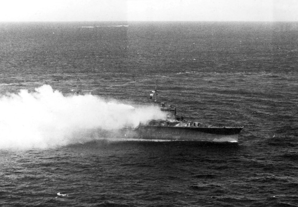 Japanese light cruiser Katori burning off Truk, Feb. 1944