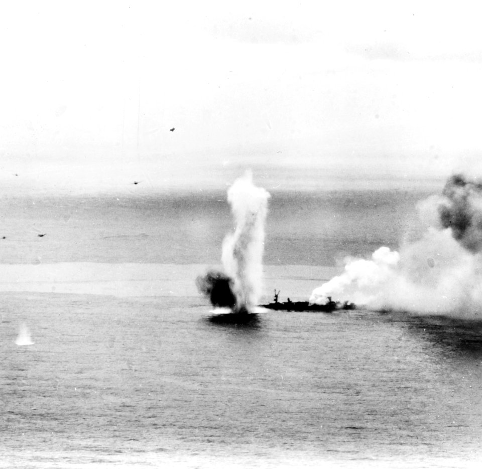 Japanese light cruiser Yahagi under attack and listing heavily, 7 April 1945 (NH 62575)