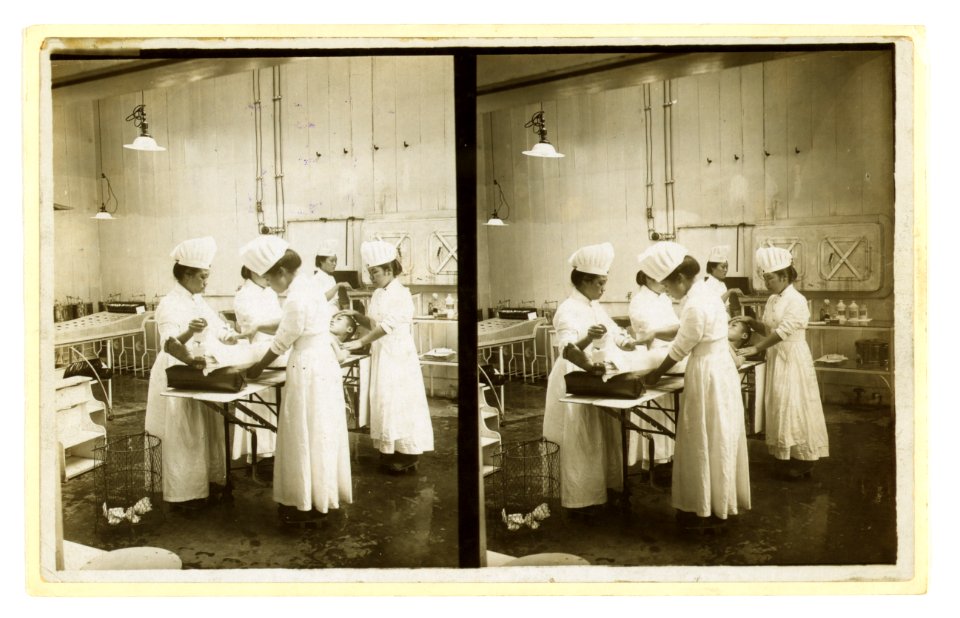 Japanese nurses attending to a patient in an operating room LCCN2005678646
