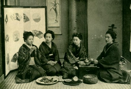 Japanese over a cup of tea. Before 1902 photo