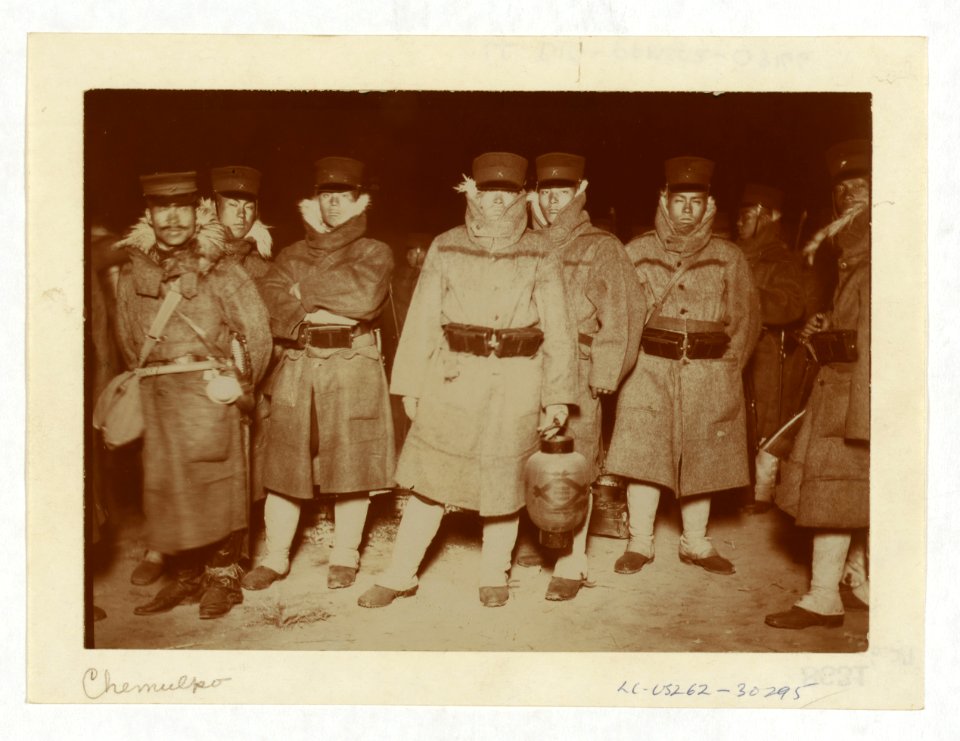 Japanese soldiers landed at Chemulpo after naval battle, waiting on a beach to entrain to Seoul LCCN2005679337
