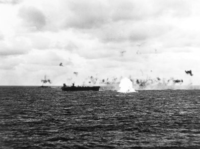 Japanese aircraft crashes near USS Belleau Wood (CVL-24) on 23 February 1944 (80-G-218422)