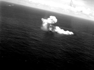 Japanese light cruiser Katori burning off Truk in February 1944