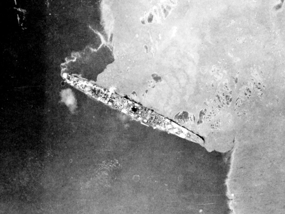Japanese light cruiser Yahagi lies motionless after a torpedo hit, 7 April 1945 (80-G-316088)