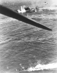 Japanese Matsu-class destroyer and carrier during Battle off Cape Engaño 1944