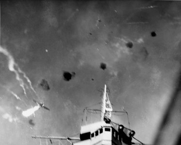 Japanese Aichi D3A dive bomber shot over USS Enterprise (CV-6) on 24 August 1942 (80-G-31349)