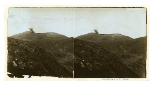 Japanese shells bursting on 203 Metre Hill, captured by desperate assault, seen from Port Arthur LCCN2005678611