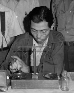 Japanese American using pharmacy balance on 28 June 1942, Manzanar Relocation Center, Manzanar, California. Chemists, nurserymen, and plant propagators at th . . . - NARA - 538037 (cropped) (cropped)