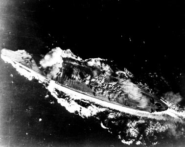 Japanese battleship Yamato is hit by a bomb during the Battle of the Sibuyan Sea, 24 October 1944 (80-G-325952)