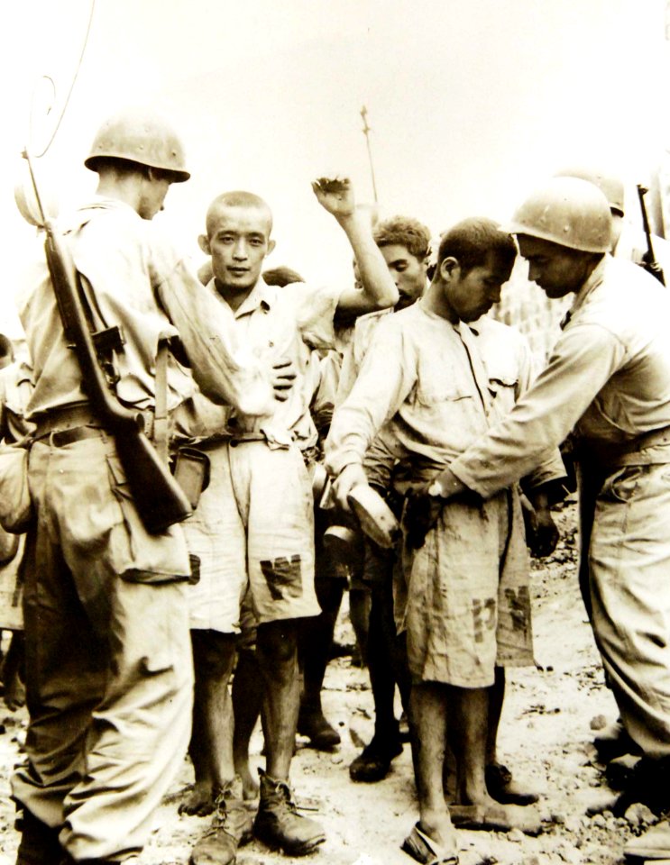 Japanese prisoners of war under direction of military police in the Philippine Islands, WWII (34340839541)