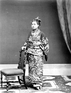 Japanese Woman Holding a chair