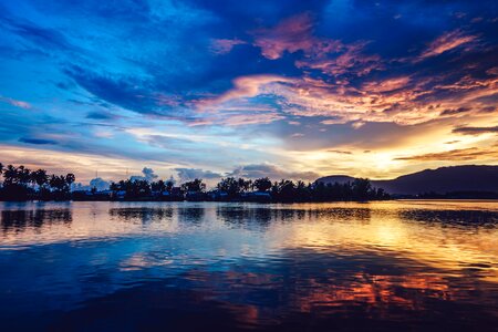 Sunrise dark lake photo