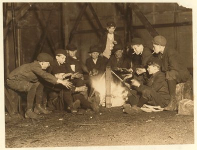 Jefferson St. Gang of newsboys at 10-00 P.M. over campfire in corner lot behind bill-board. Jefferson St. near Olive. May 7, 1910. Witness E.N. Clopper,. LOC nclc.03470