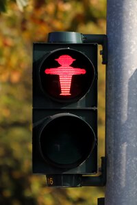 Red pedestrian crossing traffic signal