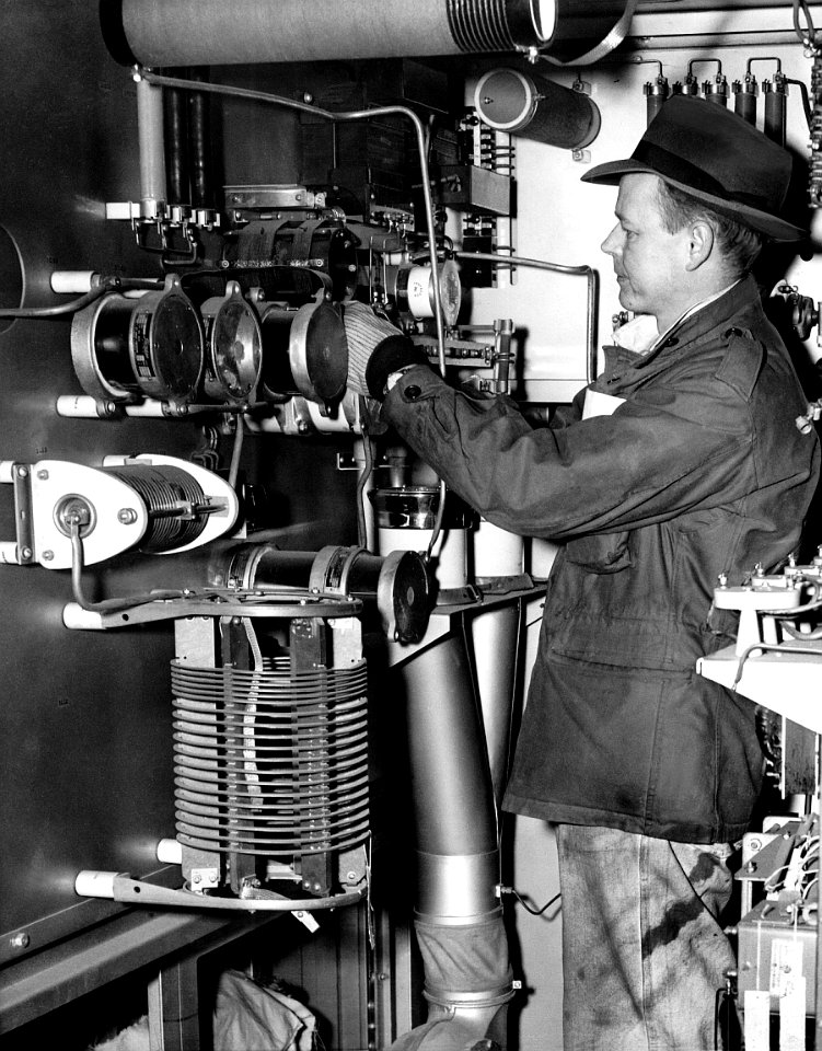 Jean Wycoff Seymour inspects rca components