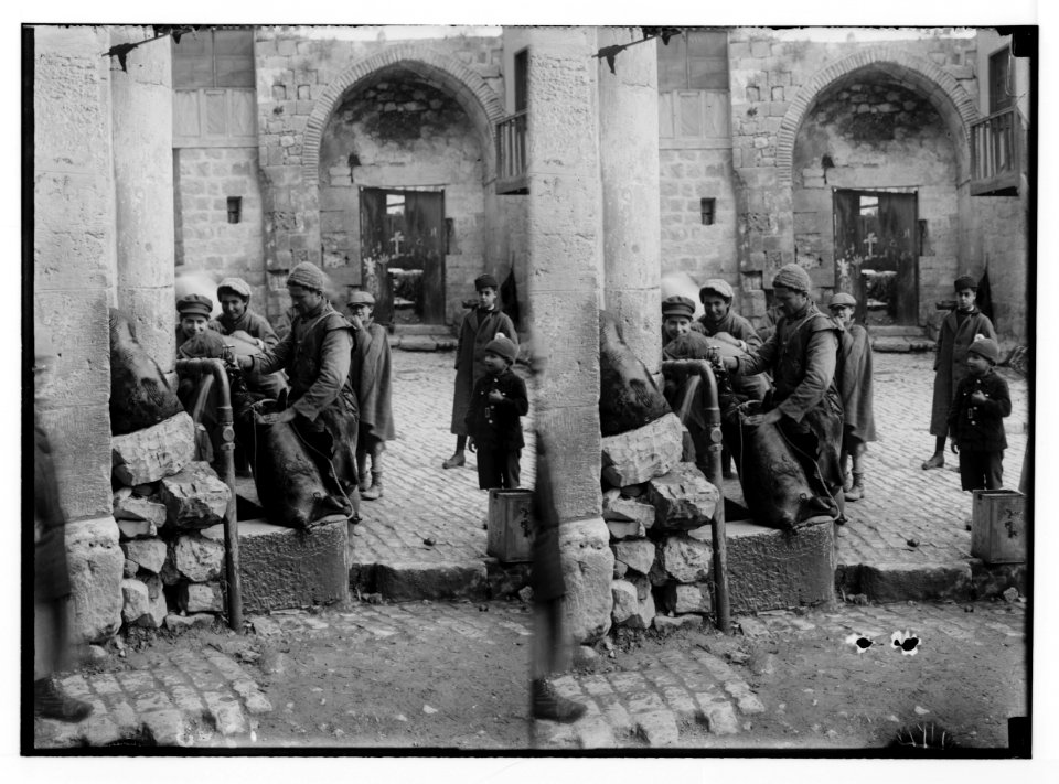Jerusalem water works. Filling waterskins at Damascus Gate LOC matpc.02278