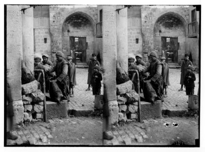 Jerusalem water works. Filling waterskins at Damascus Gate LOC matpc.02278