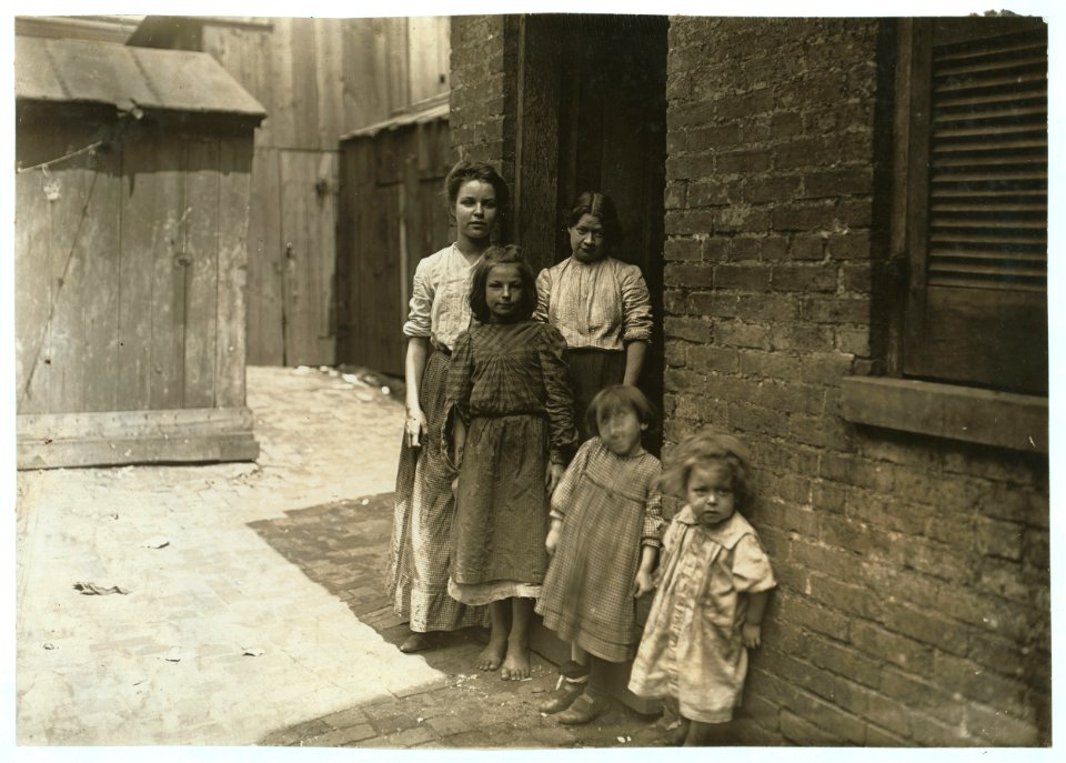 Jessie D-- (the tallest girl) and some of her charges. Girl in doorway is her boon Companion. LOC nclc.04453