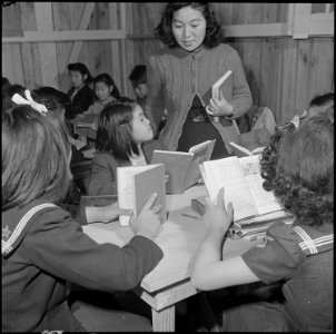 Jerome Relocation Center, Denson, Arkansas. In a third grade class at the Jerome Center grade schoo . . . - NARA - 539330