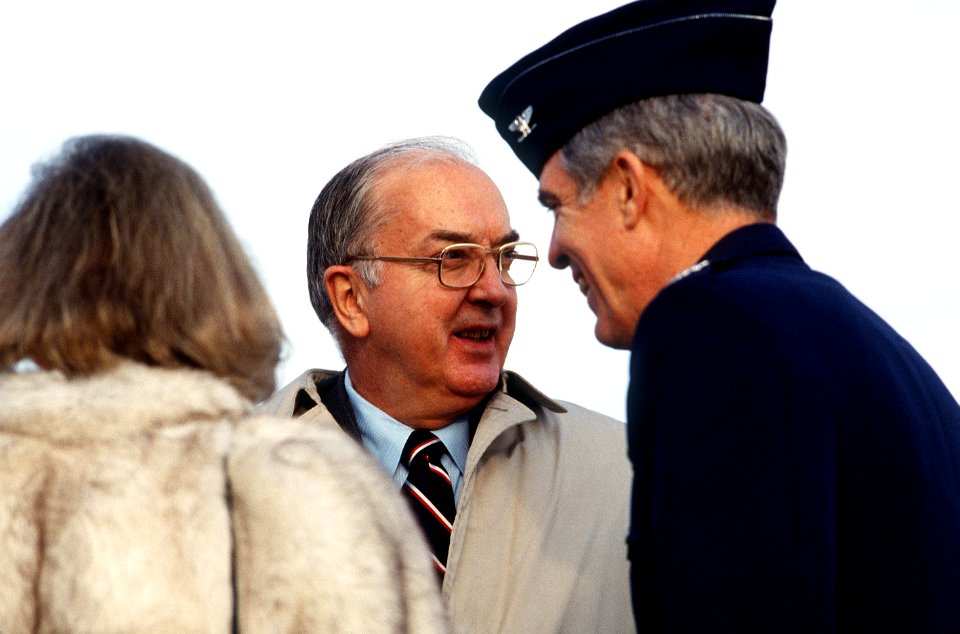 Jesse Helms is greeted by Norman Rathje and Lynn McFalls