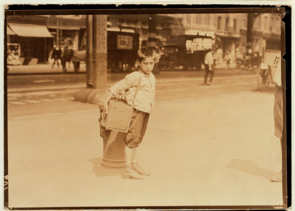 Jimmie, a seven year old bootblack, working on Canal Street, N.Y. City - July 25, 1924. LOC cph.3a21173