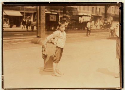 Jimmie, a seven year old bootblack, working on Canal Street, N.Y. City - July 25, 1924. LOC cph.3a21173