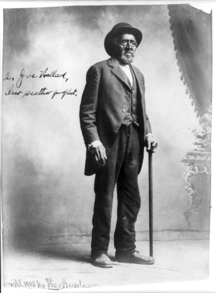 Joe Ballard, full, standing, facing right, our weather prophet LCCN2006687455