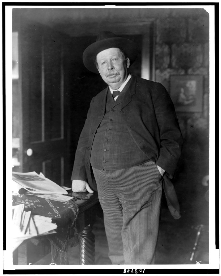 Joel Chandler Harris, three-quarter-length portrait, standing, facing slightly left LCCN91785888