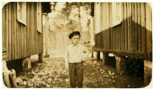 Joey Stubeck, five years old. Shucks some at Pass Christian. LOC nclc.00856