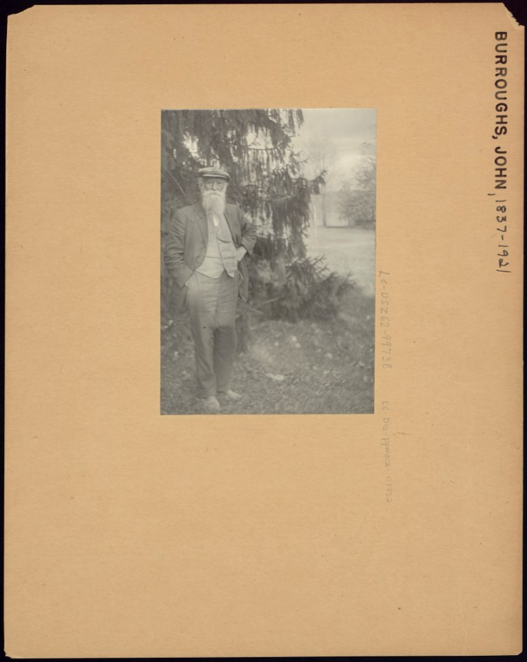 John Burroughs, author and naturalist, full-length portrait, standing, facing front, outside his home LCCN90708712