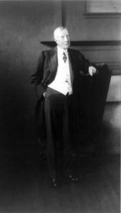 John Davison Rockefeller, full-length portrait, standing, facing right LCCN96508849