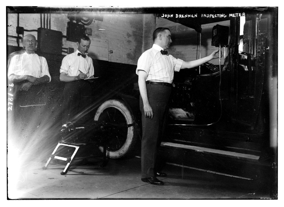 John Drennen inspecting meter LCCN2014693758