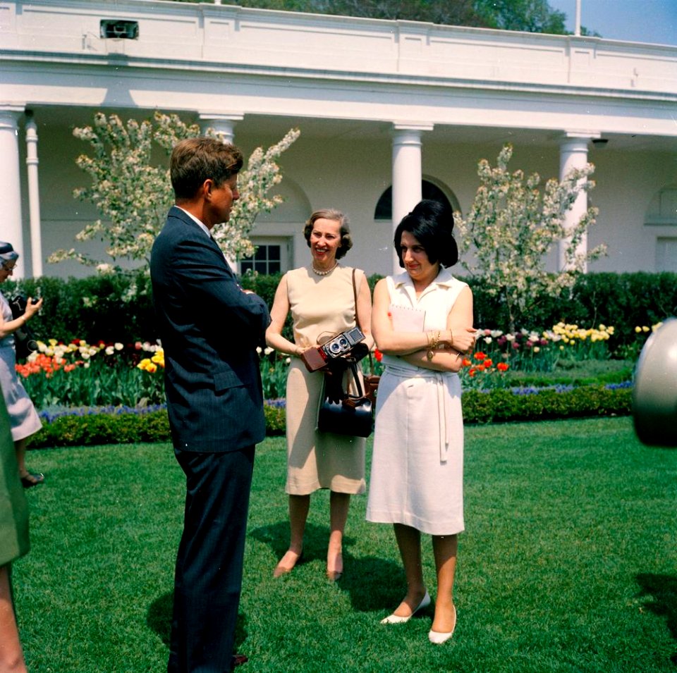 John F. Kennedy and Helen Thomas
